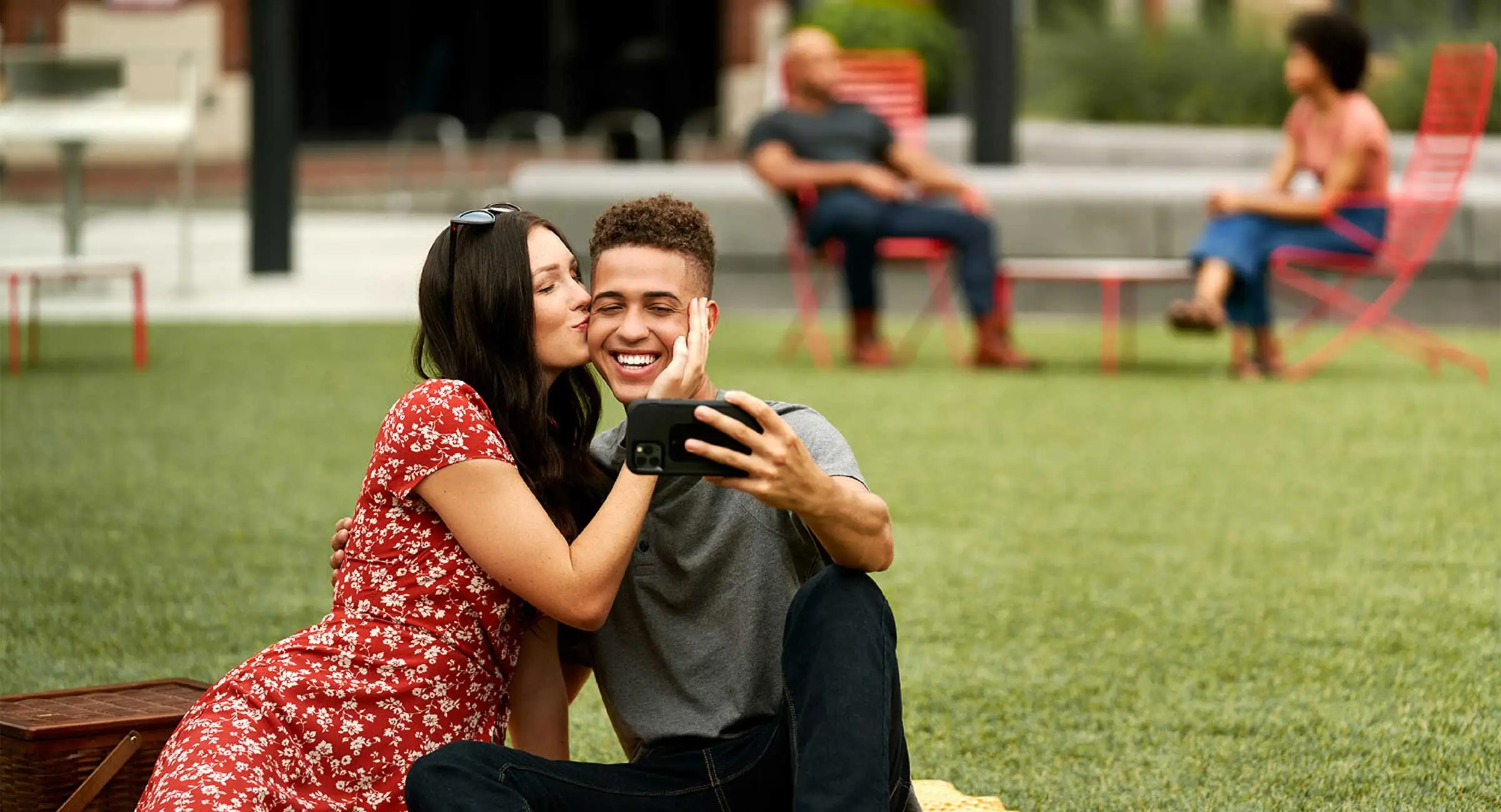 couple having a picnic on the lawn of Atlantic Station
